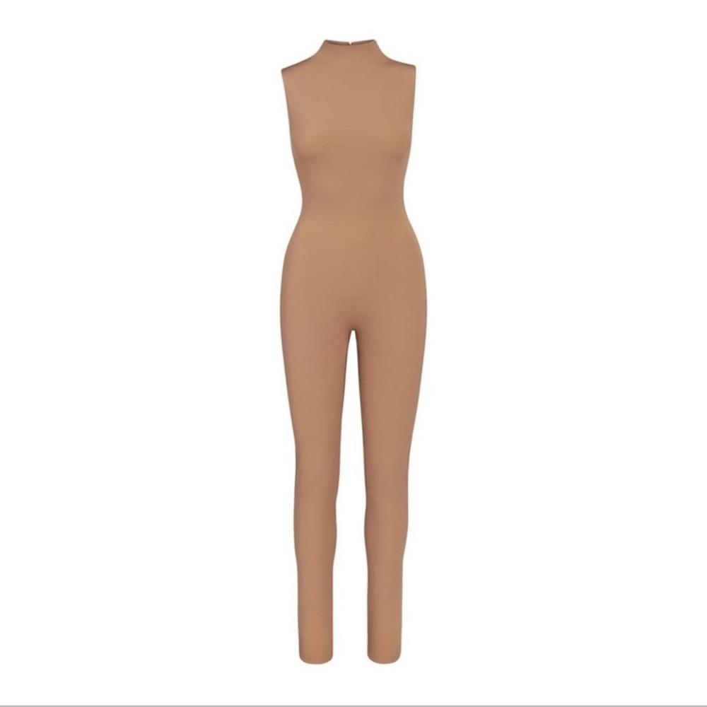 Skims ALL-IN-ONE MOCK NECK SLEEVELESS ONESIE